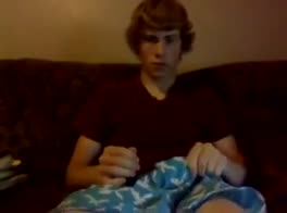 boy enjoys playing with his cock